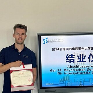student with certificate