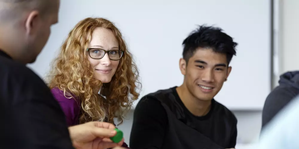 Two students looking into the camera